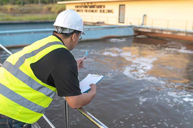 Engineer Conducts Inspects at a Treatment Plant